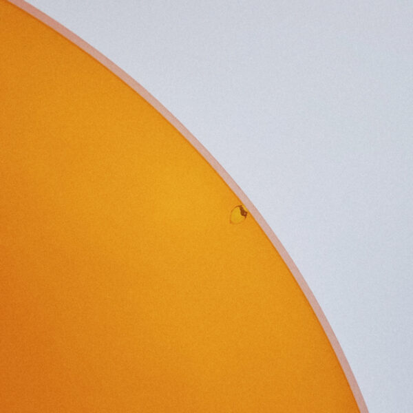 Mid-Century Orange Art Glass Vase with Applied Scroll Feet, detail view
